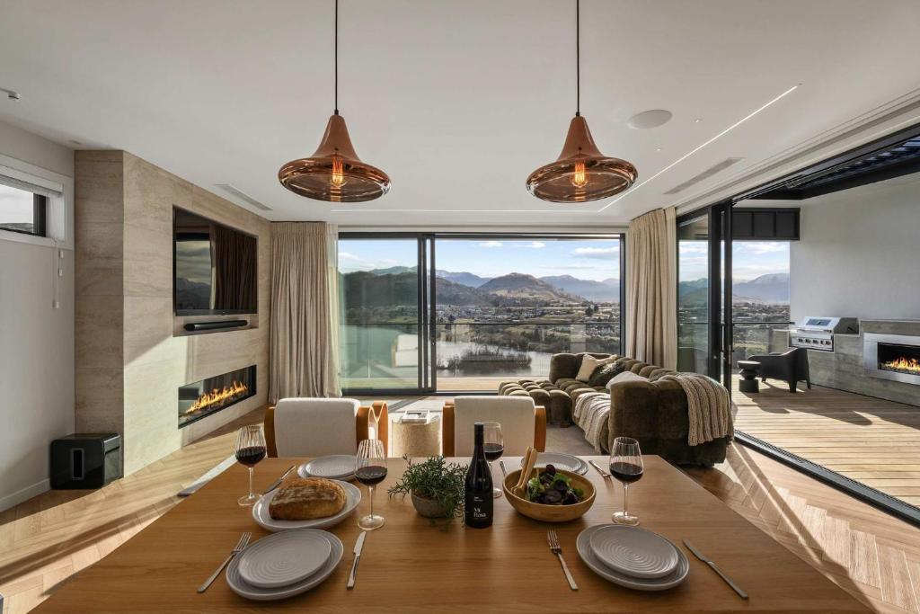 a living room with a table with wine glasses at Northview Residence in Frankton