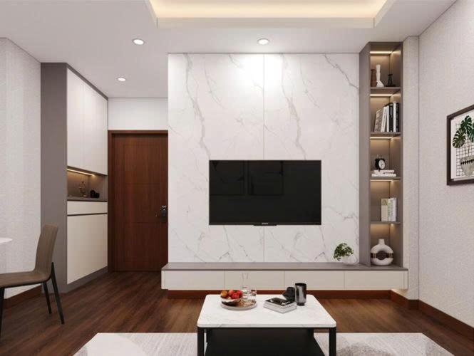 Asahi Luxstay - Benhill Apartment Binh Duong في Thuan An: غرفة معيشة مع تلفزيون بشاشة مسطحة على الحائط