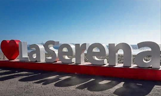 a large sign with a red heart on it at Mi casa es tu casa in La Serena