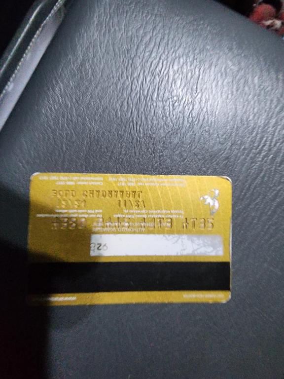 a yellow tag on the side of a purse at Bold in Ulaanbaatar