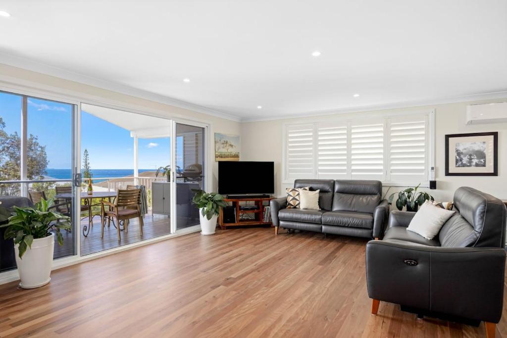 Et opholdsområde på Elegant luxury on First Ave - executive penthouse