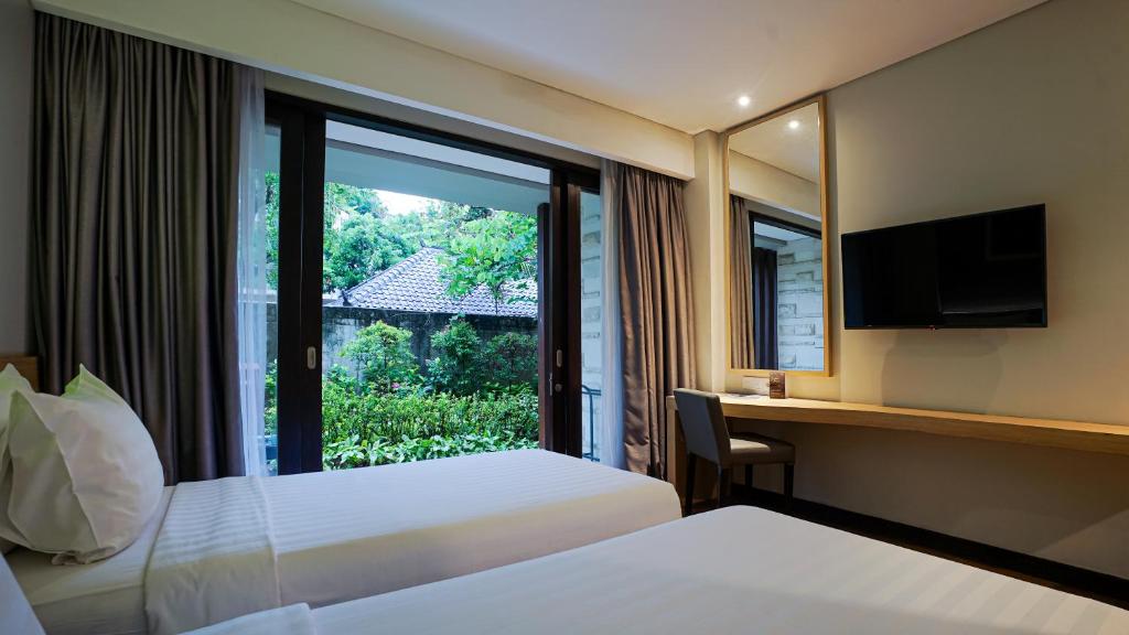 Grand Whiz Hotel Nusa Dua Bali - Photo 2