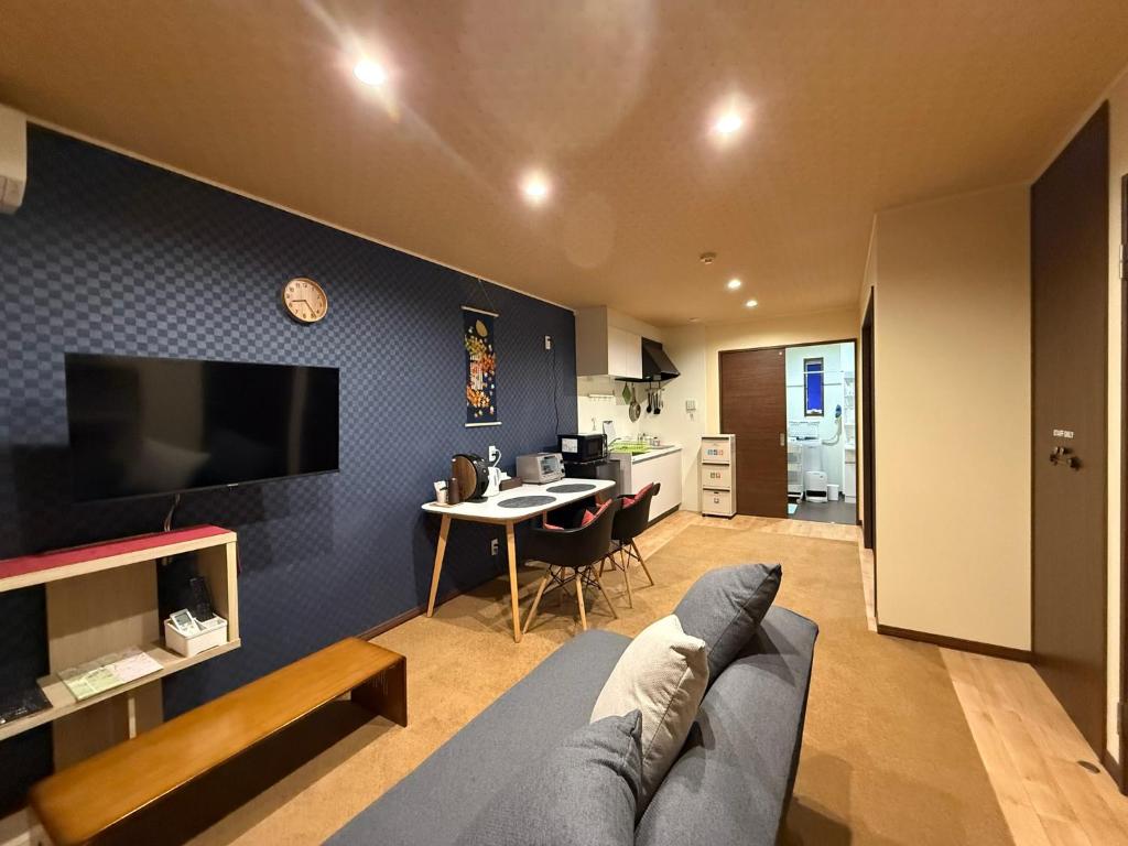 Телевизор и/или развлекательный центр в Vieuno Hida Takayama