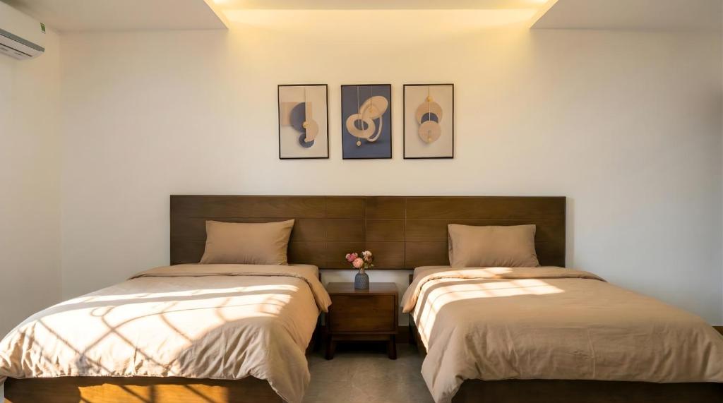 Giường trong phòng chung tại Katka Hotel River 2 Hai Phong