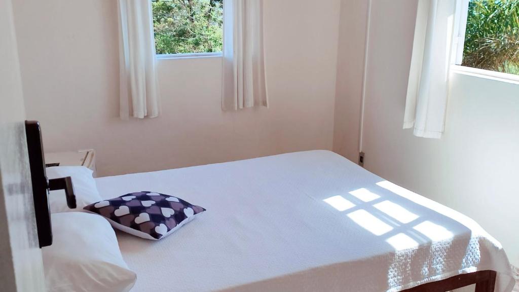 Postel nebo postele na pokoji v ubytování Code In Hospedaria