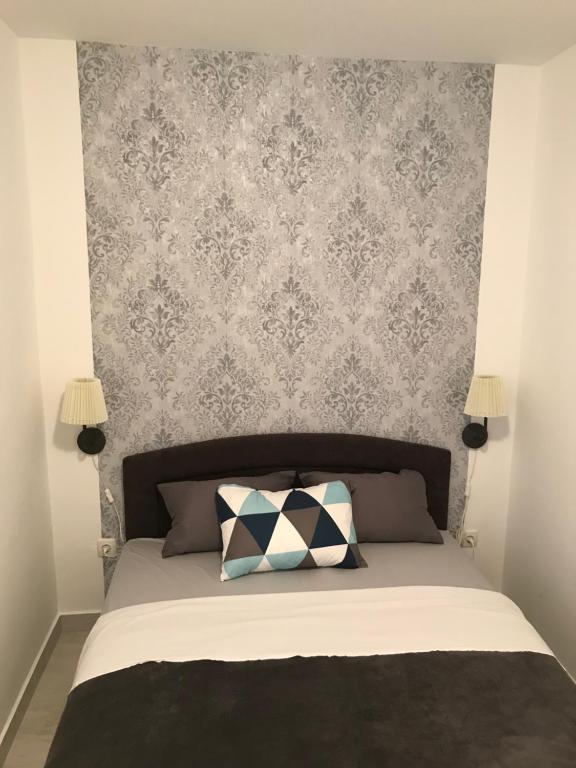 Postel nebo postele na pokoji v ubytování Apartman Dramalj