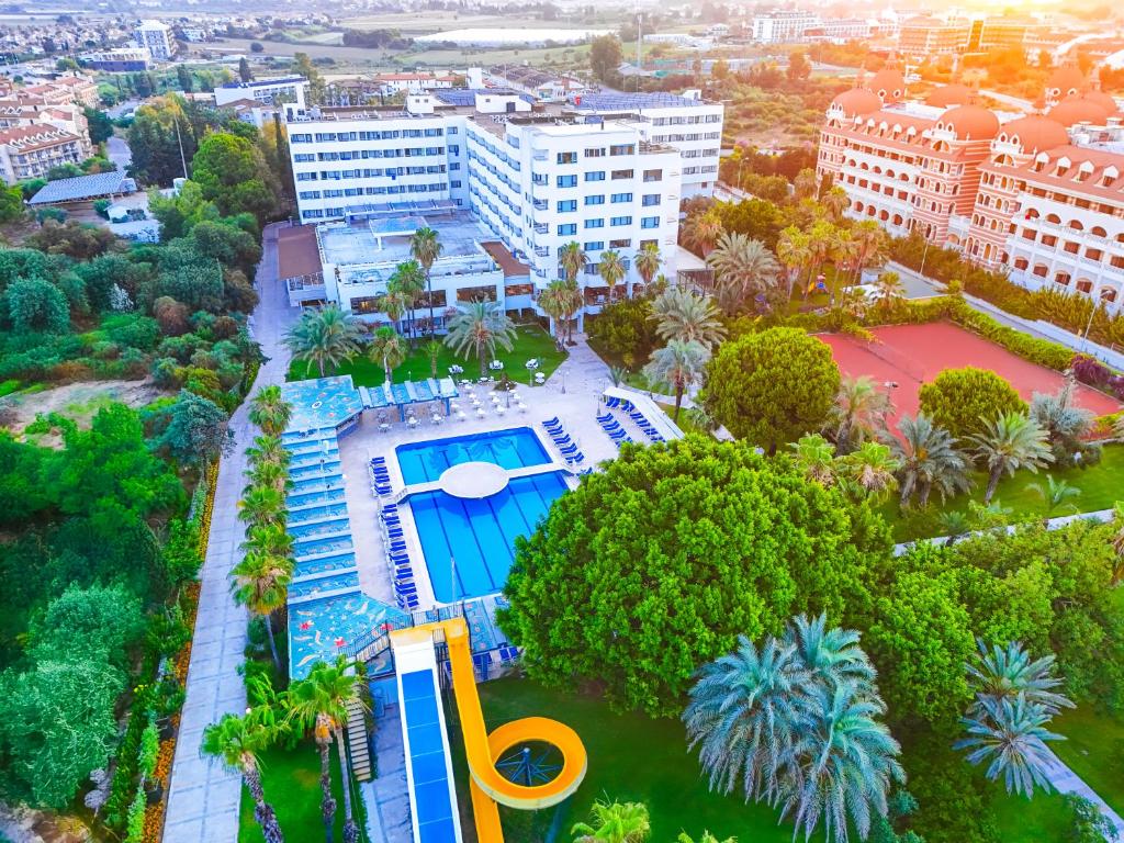 an overhead view of a building with a swimming pool at Sural Hotel in Side