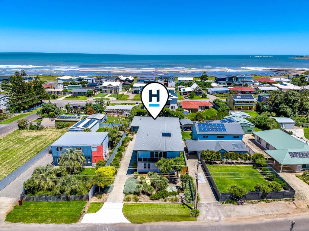 an aerial view of a suburb with a arrow pointing to a house at 65 McLeod Rd Middleton Pet Friendly Wi-Fi - No Linen Included in Middleton