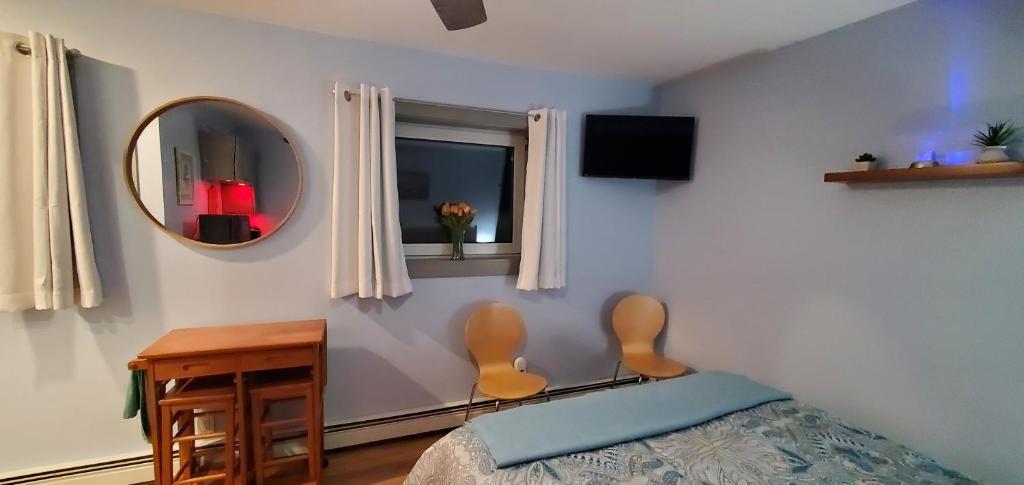 Ένα ή περισσότερα κρεβάτια σε δωμάτιο στο Borealis Bungalow