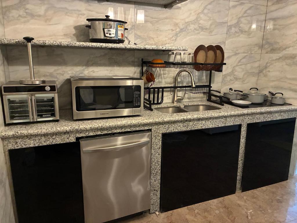 Kuchyň nebo kuchyňský kout v ubytování BridgeView Arcadia