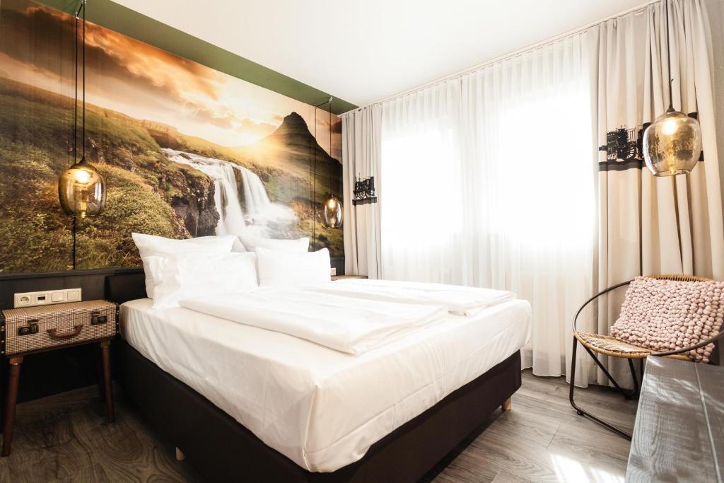 Ένα ή περισσότερα κρεβάτια σε δωμάτιο στο Best Western Hotel Nürnberg am Hauptbahnhof