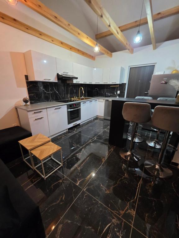 Nhà bếp/bếp nhỏ tại Domek całoroczny Jantar - 2 sypialnie, max 6 osób