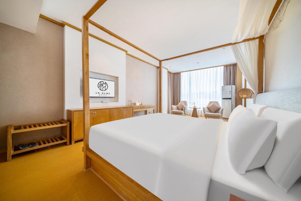 Postel nebo postele na pokoji v ubytování Wuyue Store 2