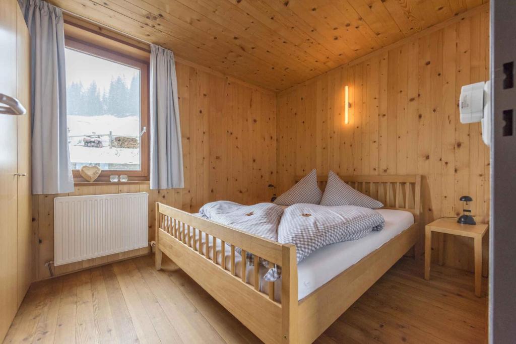 Postel nebo postele na pokoji v ubytování Apartment near Slopes in Warth-Vorarlberg 44984