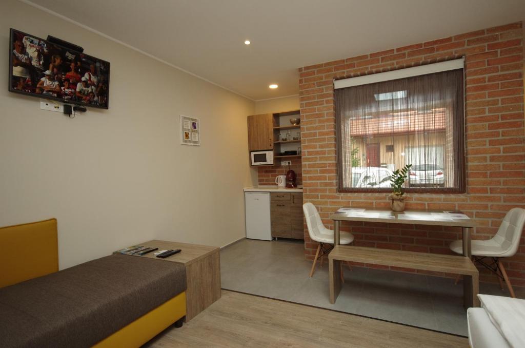 Kuchyňa alebo kuchynka v ubytovaní Mosoly Deluxe Apartman