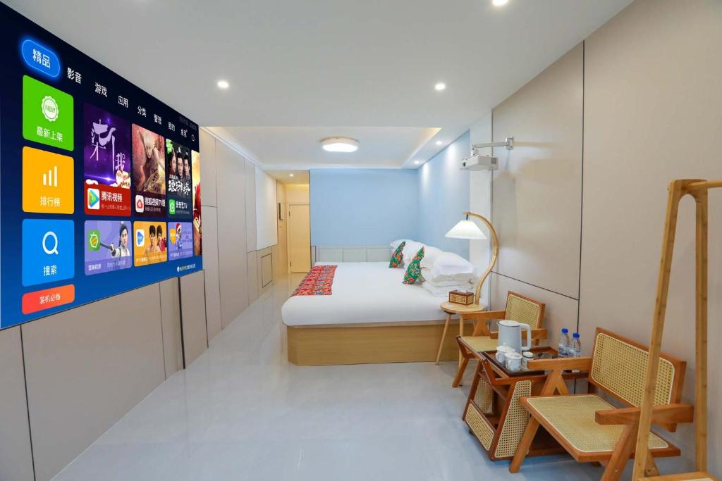 Una cama o camas en una habitación de Xuexiang zhanglicheng homestay