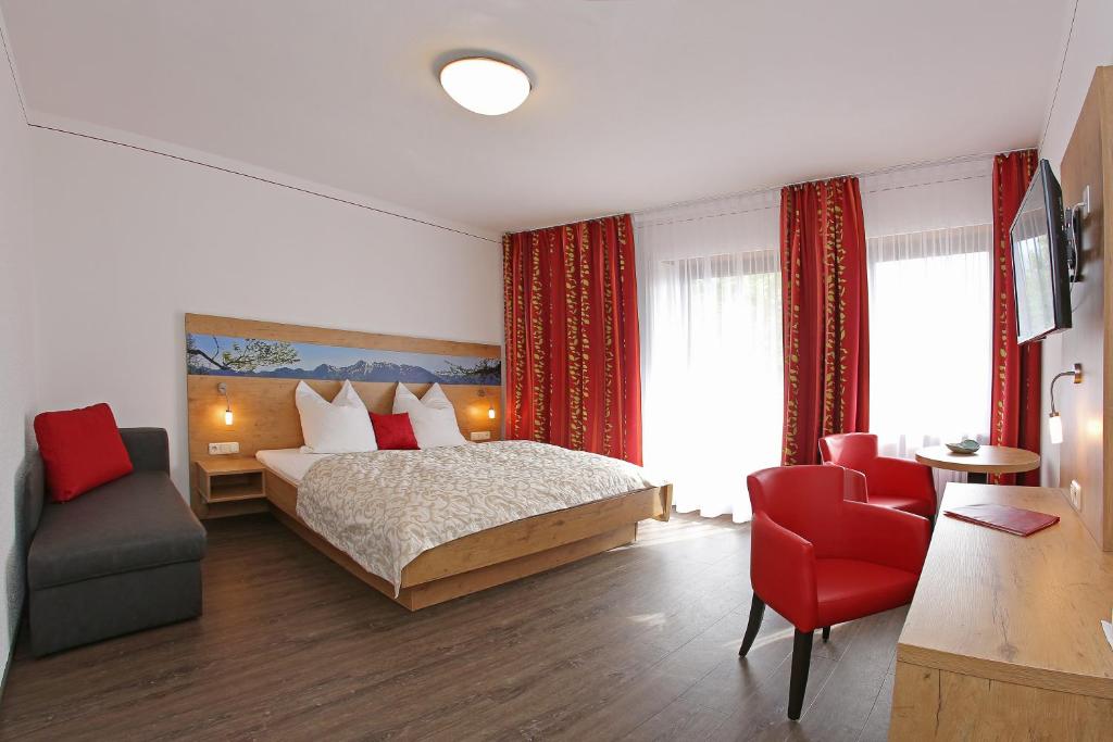 Postel nebo postele na pokoji v ubytování Hotel Seiserhof & Seiseralm