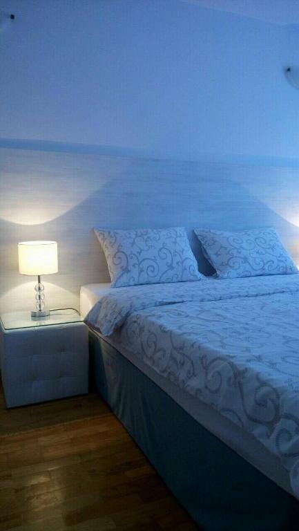 Postel nebo postele na pokoji v ubytování Apartment Zindan
