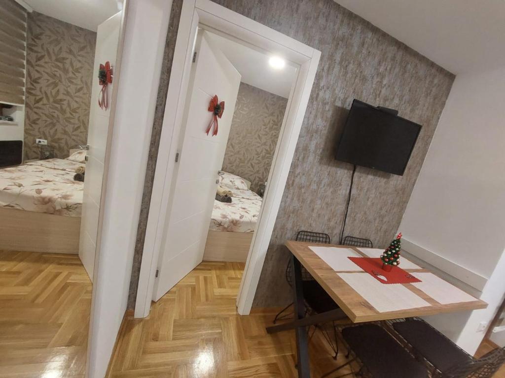 Postel nebo postele na pokoji v ubytování Apartman Loly Zlatibor