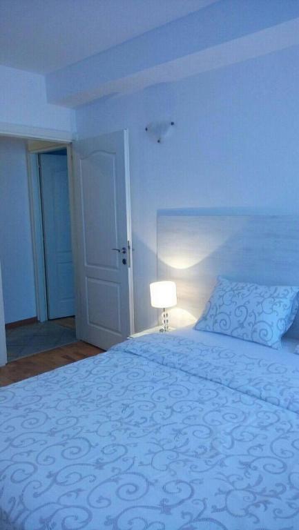 Postel nebo postele na pokoji v ubytování Apartment Zindan