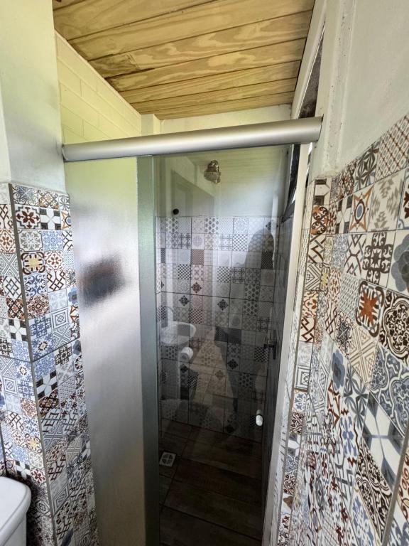 Ένα μπάνιο στο Chalé na beira da lagoa com vista