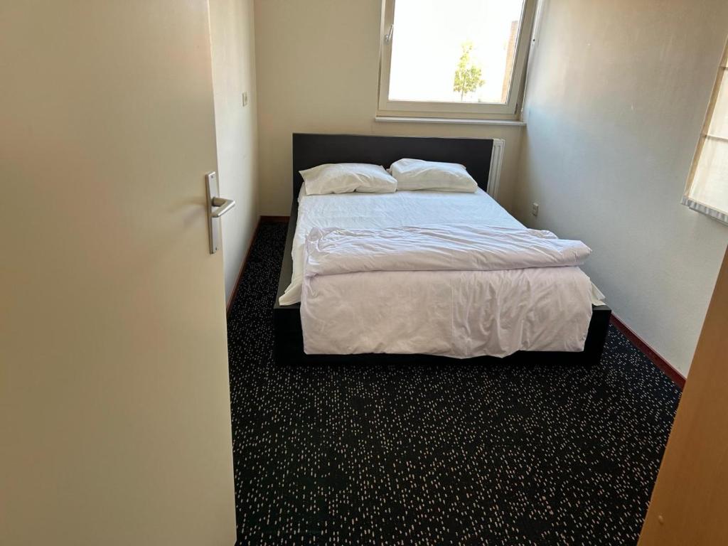 Postel nebo postele na pokoji v ubytování Fokkeboom