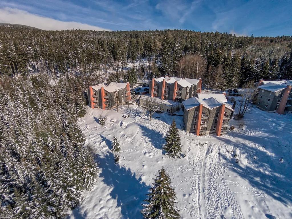 an aerial view of a resort in the snow at Brockenblick Ferienpark in Schierke