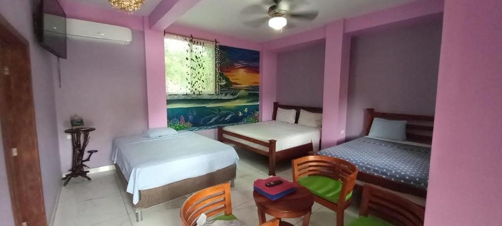 Giường trong phòng chung tại Lokoo Resort