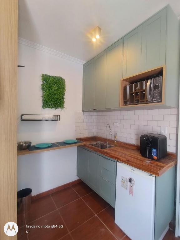 Кухня или мини-кухня в Lofts Baronesa
