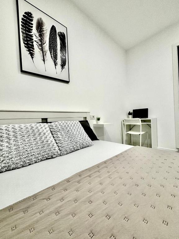 Postel nebo postele na pokoji v ubytování Casa Capitan Coliving Digital Nomads