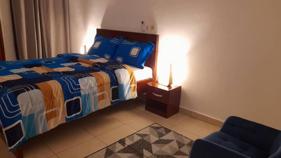 En eller flere senge i et værelse på DS Residence509