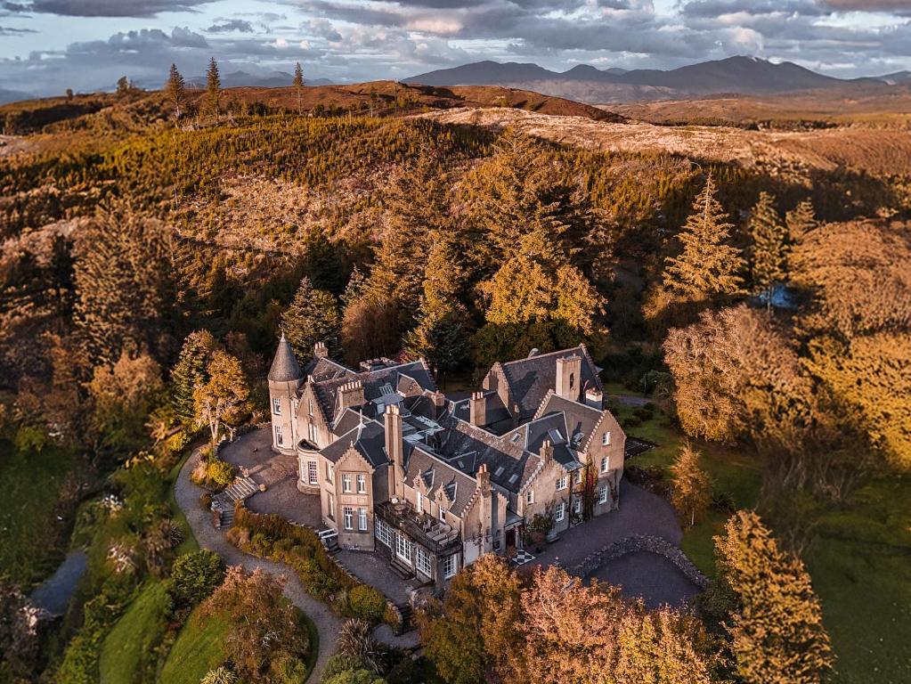 an aerial view of a large house on a hill at Glencruitten House in Oban