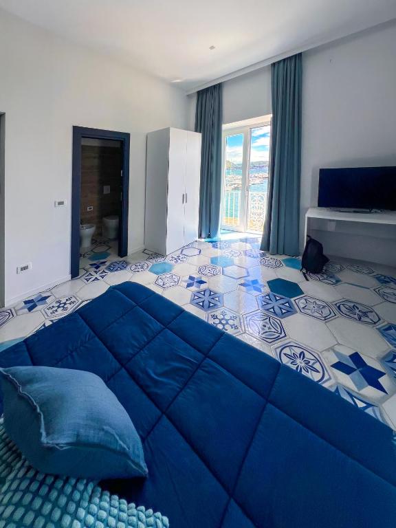 Llit o llits en una habitació de MaisonVenere
