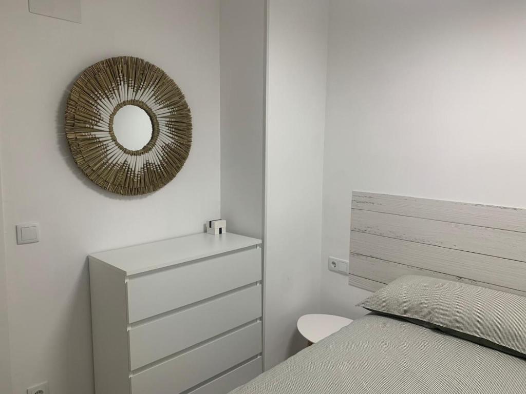 Postel nebo postele na pokoji v ubytování Penismar Paradis