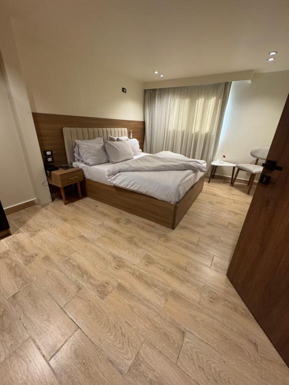 Postel nebo postele na pokoji v ubytování Pyramids hotel Merak