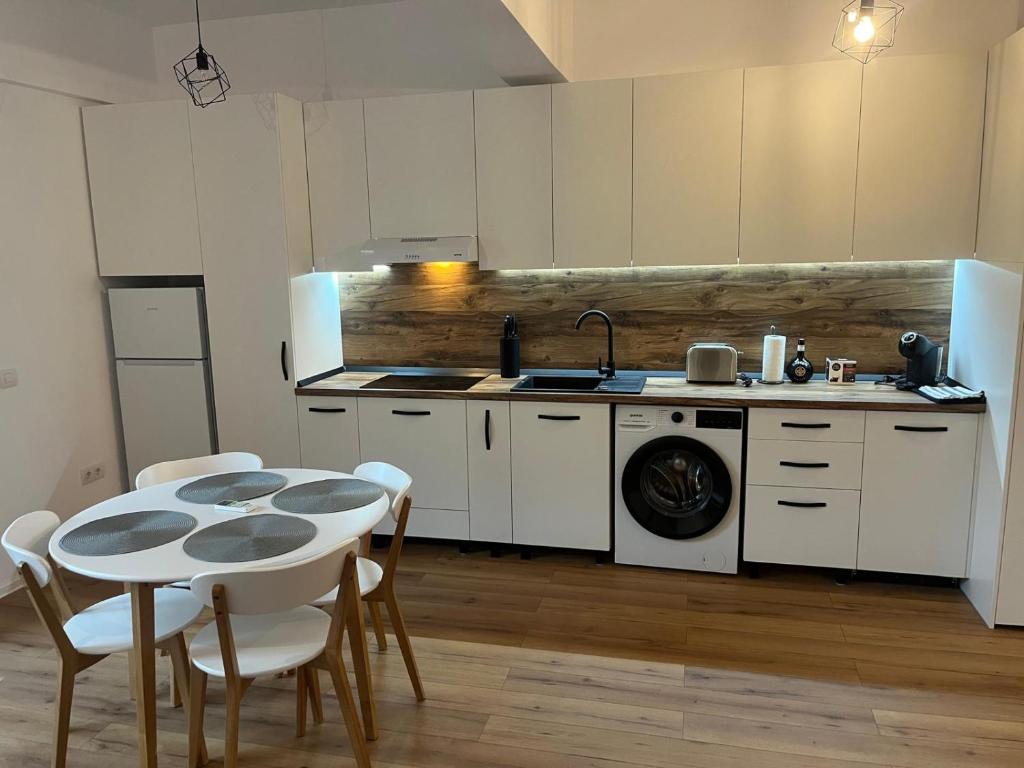 Kuchyň nebo kuchyňský kout v ubytování BB Central Apartments