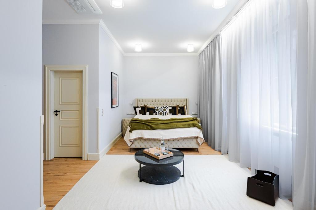 En eller flere senge i et værelse på Bohemia Boutique Hotel Prague