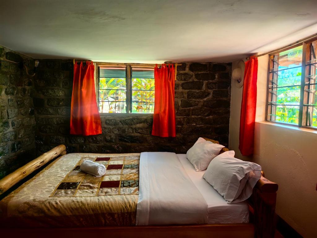 Postel nebo postele na pokoji v ubytování Teryet Safari Lodge