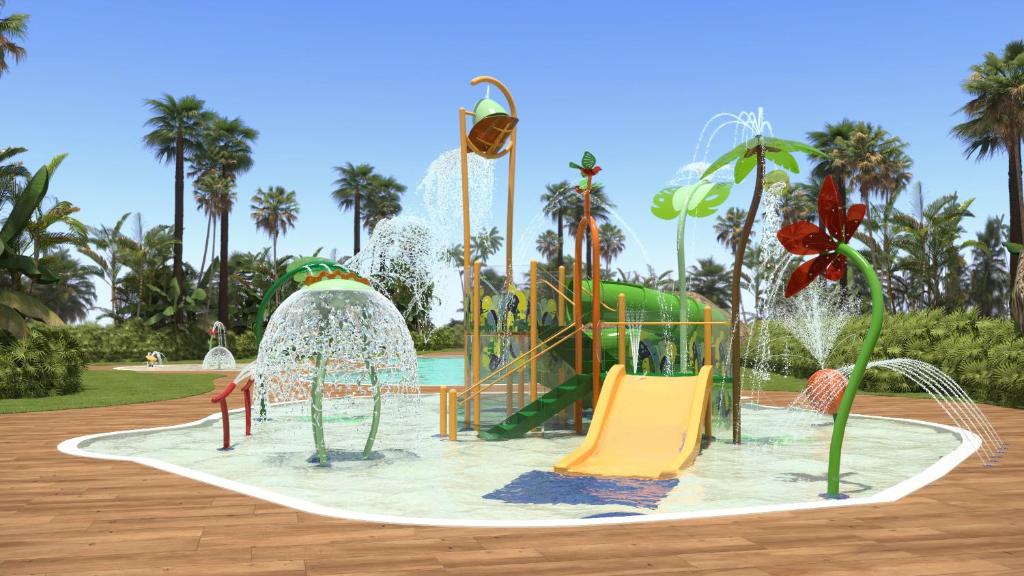 a water park with a water slide and slides at Palas Pineda in La Pineda