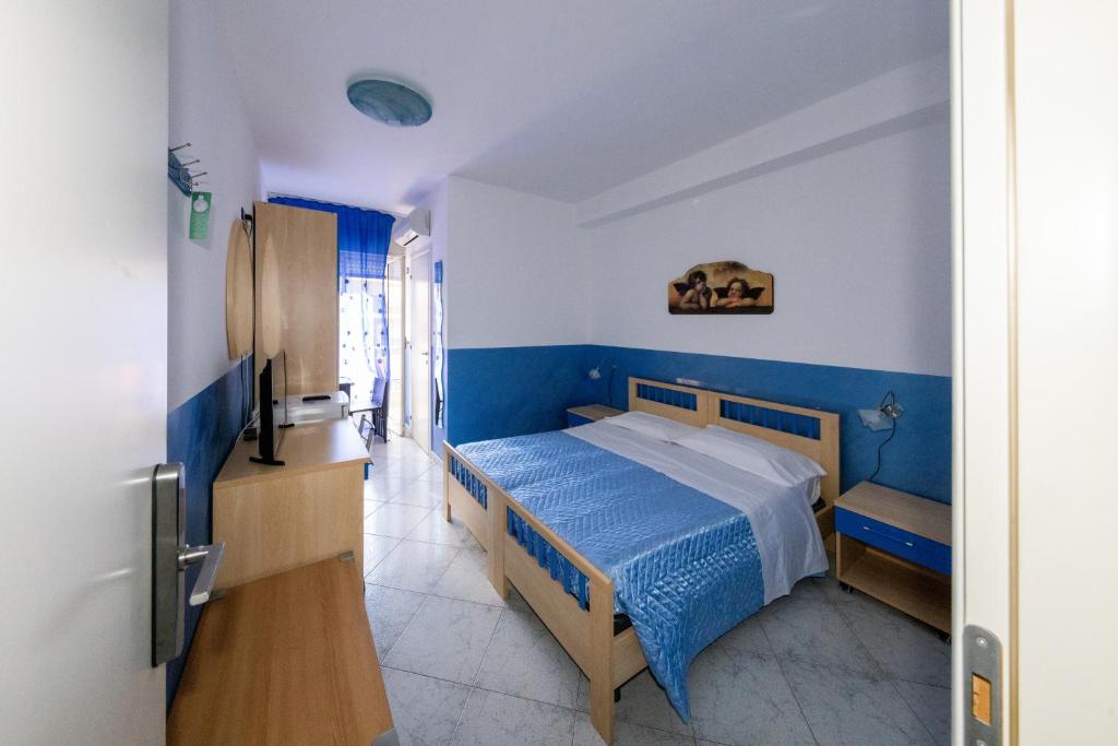 Кровать или кровати в номере B&B Brezza Marina & Ristorante Shoreline