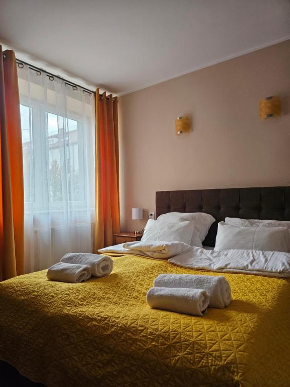 Ένα ή περισσότερα κρεβάτια σε δωμάτιο στο PLATINIUM House ex Royal House