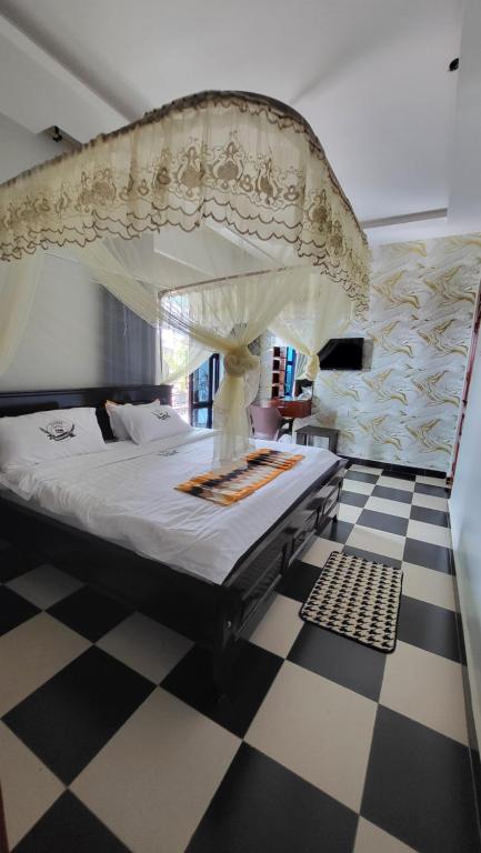 Postel nebo postele na pokoji v ubytování Tigris Residence