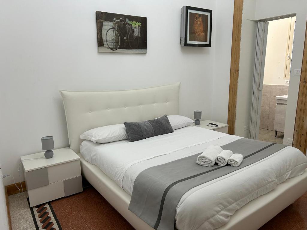 Ένα ή περισσότερα κρεβάτια σε δωμάτιο στο Maison Dominique