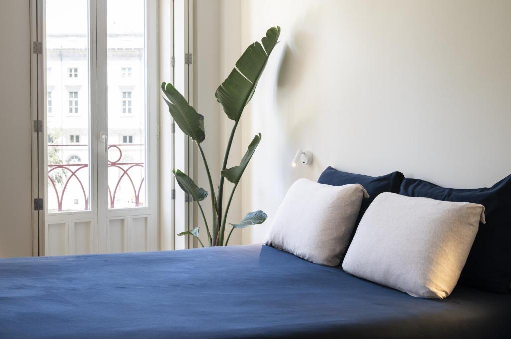 Postel nebo postele na pokoji v ubytování Gharb