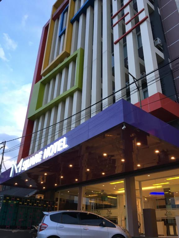 a car parked in front of a building at MSquare Palembang in Palembang