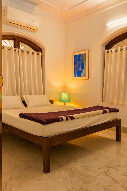 Ένα ή περισσότερα κρεβάτια σε δωμάτιο στο Entire Villa in Darbhanga