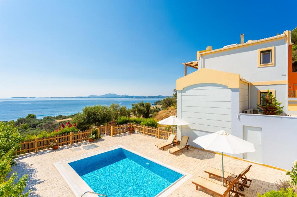 an image of a villa with a swimming pool at Villa Alya View in Barbati