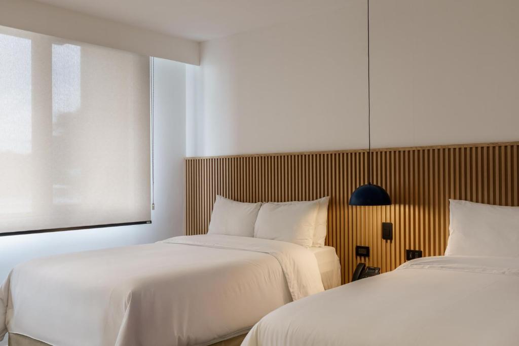 En eller flere senge i et værelse på Best Western Plus Hotel Terraza