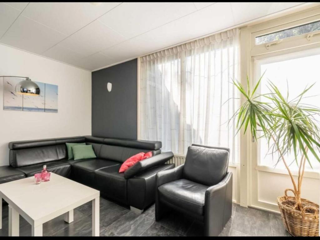 Χώρος καθιστικού στο Scheldeoord 54