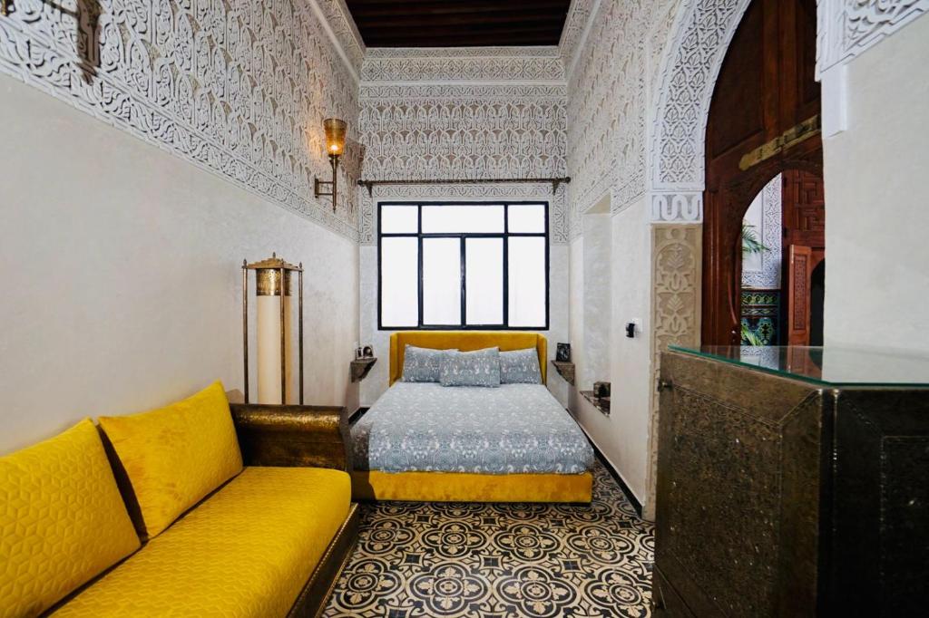 Ένα ή περισσότερα κρεβάτια σε δωμάτιο στο Riad Amelia Badr Soultan Room